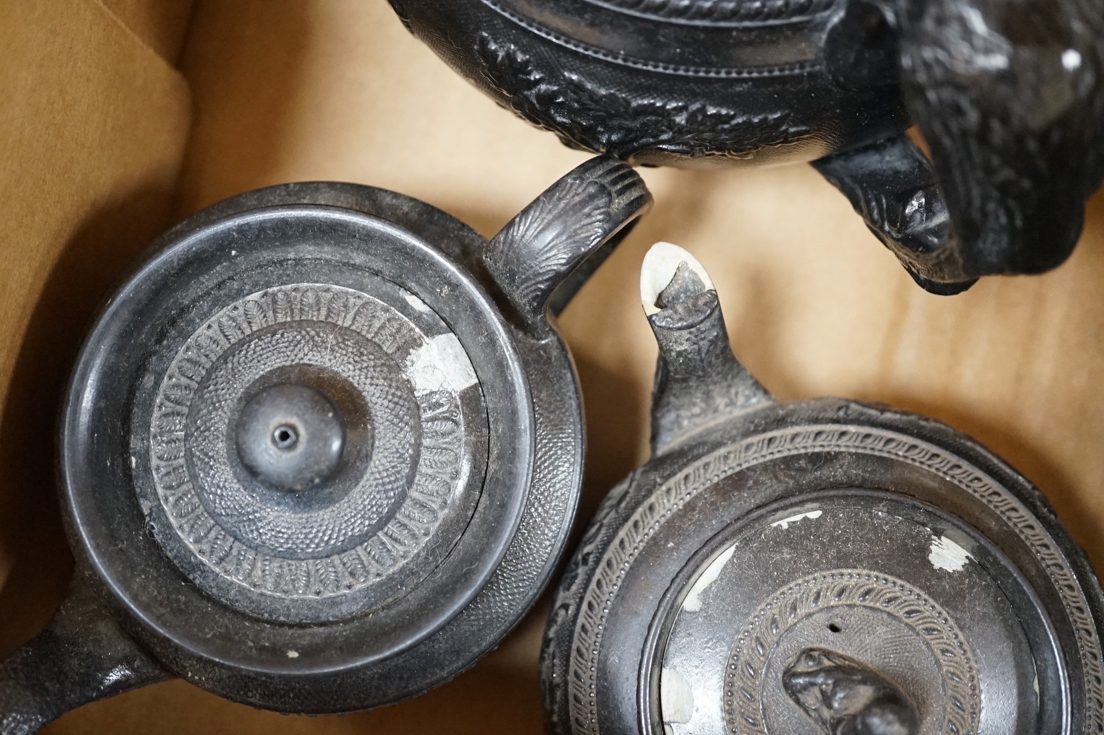 A selection of Jackfield type black glazed teapots, 19th century